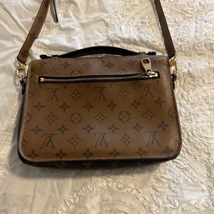 Louis Vuitton Pochette Métis